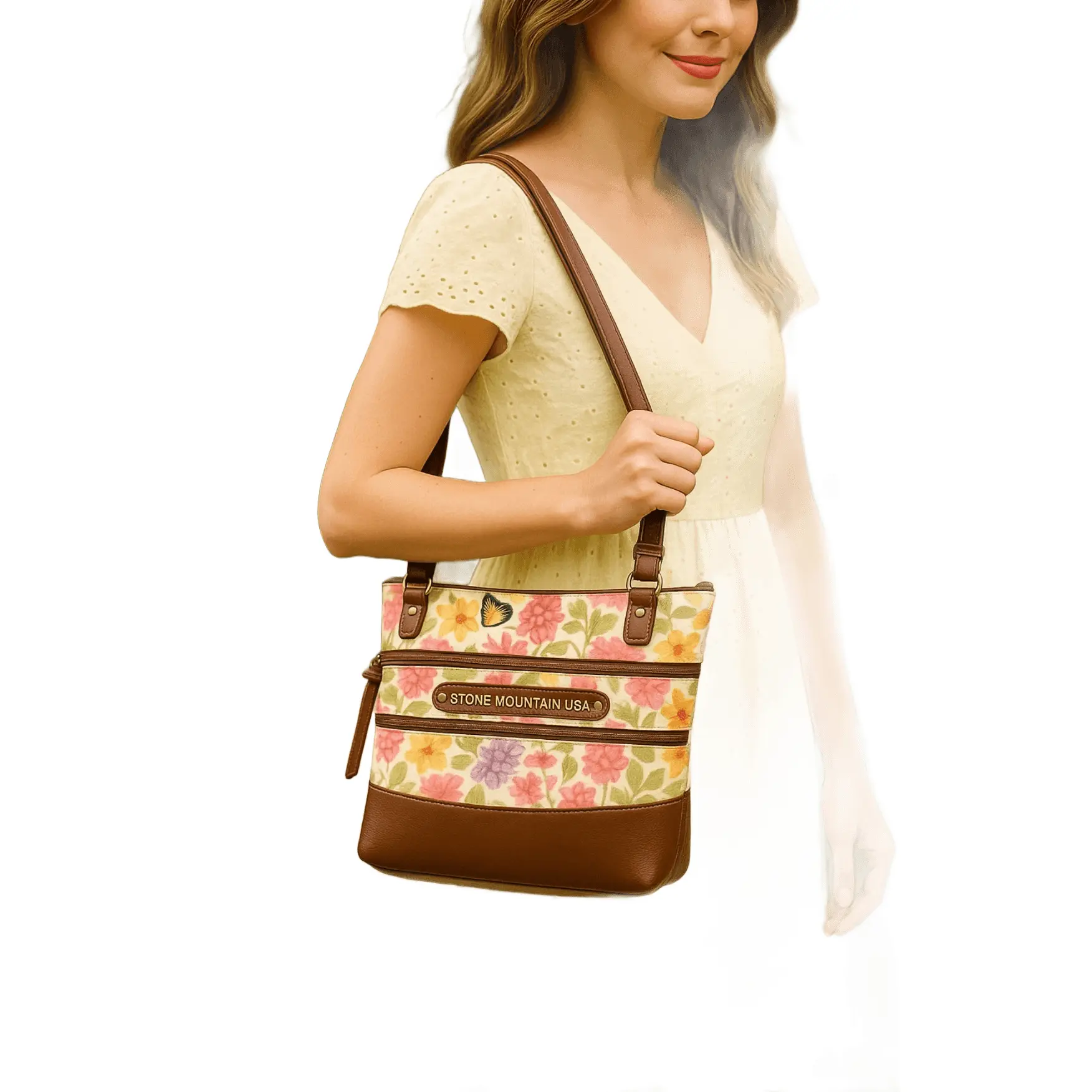 Stone Mountain USA Crossbody Bag With a Floral Canvas Panel and Brown Leather Trim.