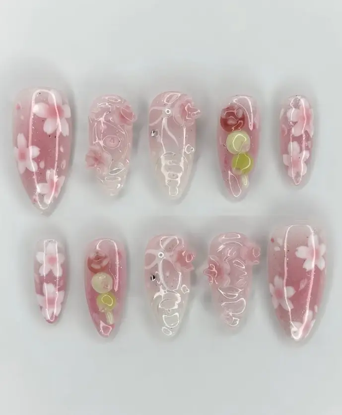 Blush pink sakura blossom nails with 3D petals, soft jelly layers and dewy drops — dreamy springtime floral elegance with a delicate feminine glow