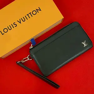 Pre-owned Louis Vuitton Calfskin Small Leather Goods Zippy Dragonne Taiga Wallet