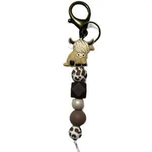 Highland Cow Keychain with Beaded Design and Unique Animal Charm
