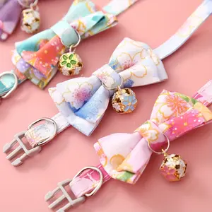 Adjustable Nylon Pet Collar with Floral Print Bowknot and Bell Detachable Design for Cats and Small to Large Dogs Ideal for Pet Owners