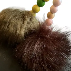 Keychains with Colorful Beads and Fuzzy Pom-Pom Attachments