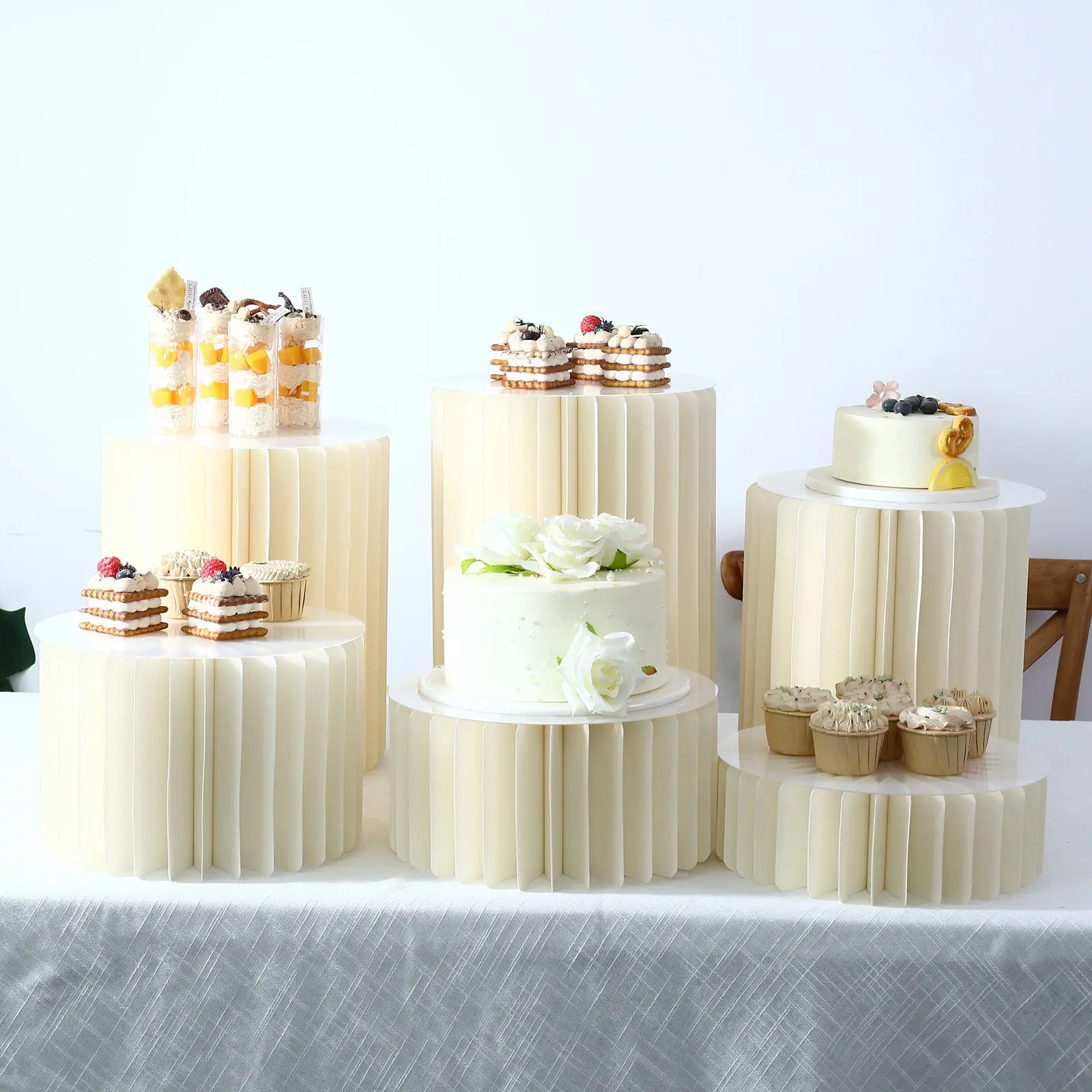 Set of 6 Ivory Buffet Risers, Foldable Cardboard Cylinder Pedestal Stands with Clear PVC Top Plates, Multi-Height Dessert Display, 4"–16"