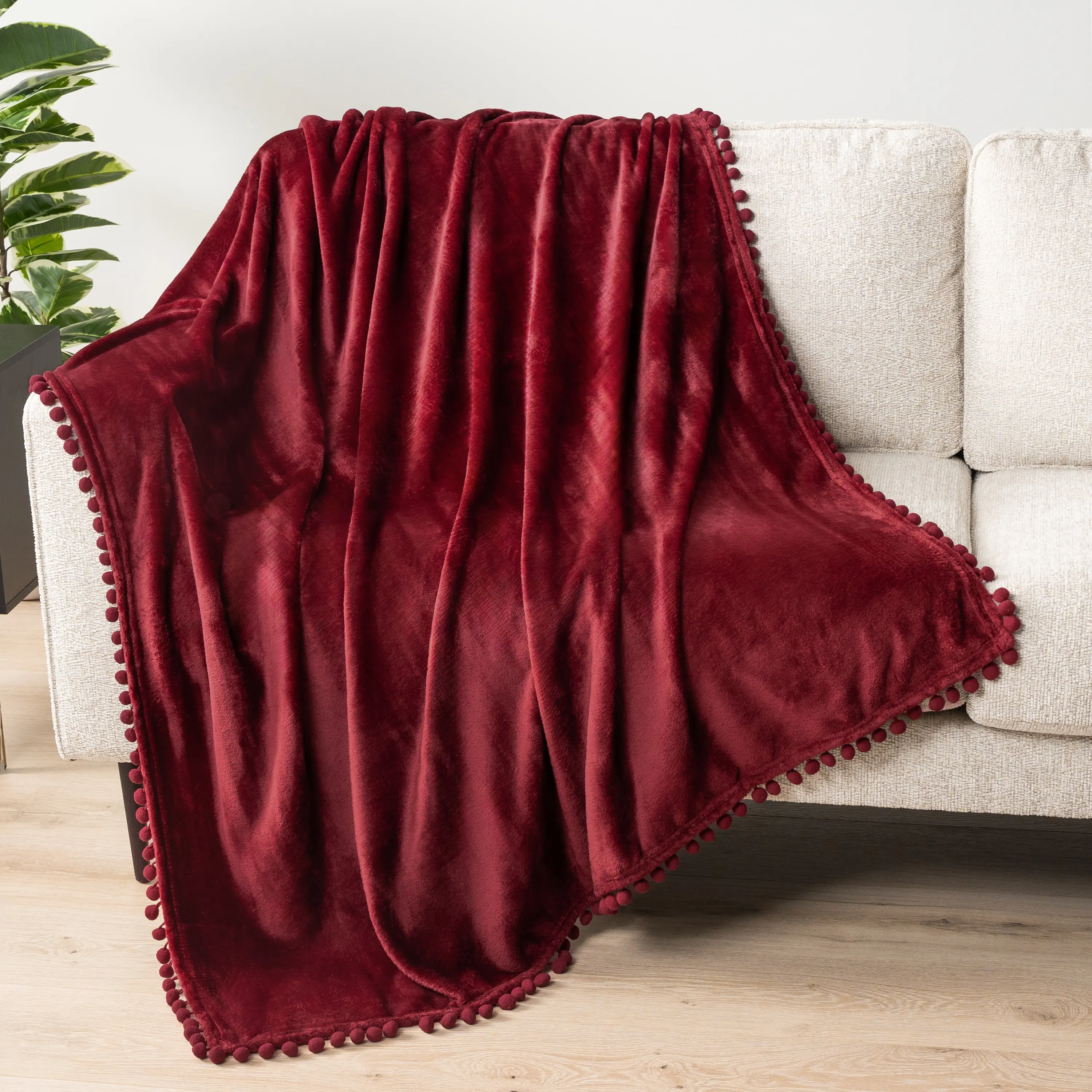 PAVILIA Fleece Throw Blanket for Couch with Pom Pom Fringe,  Soft Cozy Fuzzy Flannel Blanket for Sofa Bed, Lightweight Plush All Season Throw