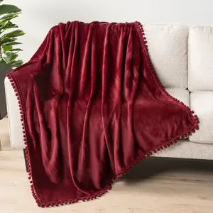 PAVILIA Fleece Throw Blanket for Couch with Pom Pom Fringe,  Soft Cozy Fuzzy Flannel Blanket for Sofa Bed, Lightweight Plush All Season Throw