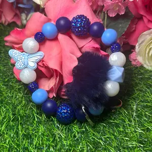 Royal flutters wristlet keychain color scheme navy, white, periwinkle and  bling beads Made with wire