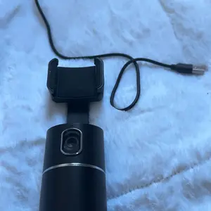 Product Review of auto Face Tracking Tripod, Mother's Day Gift,No App Required, 360° Rotation Face Body Phone Camera Mount Smart Shooting Phone Tracking Holder for Live Vlog Streaming Video, Rechargeable Battery Accessories Selfie from K**💖