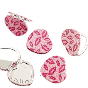 Heart-Shaped Pocket Mirror for On-the-Go Makeup Touch-Ups it’s a must have when you’re on the go.  Compact Cosmetic Daily Gift