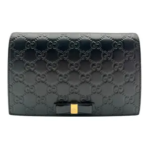 Pre-owned GUCCI GUCCISSIMA LEATHER Crossbody Bags GUCCISSIMA Black Wallet on Chain with Signature Logo Pattern and Gold tone Hardware