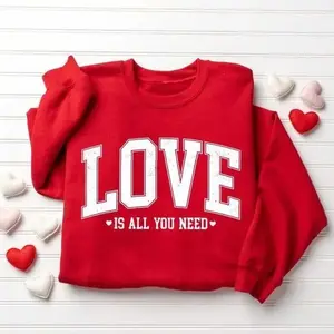 Love Valentine Sweatshirt with cute heart coquette old-school style, featuring “Love Is All You Need,” a perfect women’s gift and global trending outfit. - LORA ATCHER