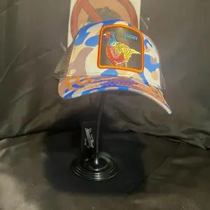 Lucky Pheasant Camouflage Trucker Cap with Colorful Design and Patch Detailing