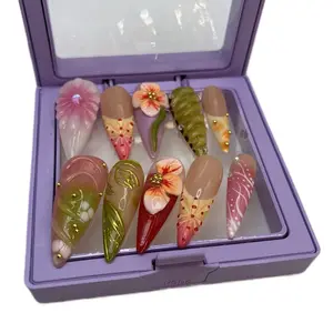 High Quality Press On Nails with Vibrant Floral Designs and Gold Accents for Elegant Manicure