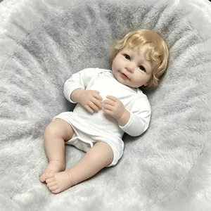 Reborn Baby Doll - Collectible Huggable Soft Doll with Short Blonde Hair, Radiant Blue Eyes, White Romper, 3/4 Arms, Gift Toy for Kids 3+