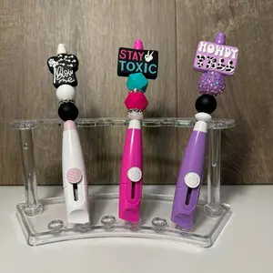 Box cutter, wine topper, badge reels