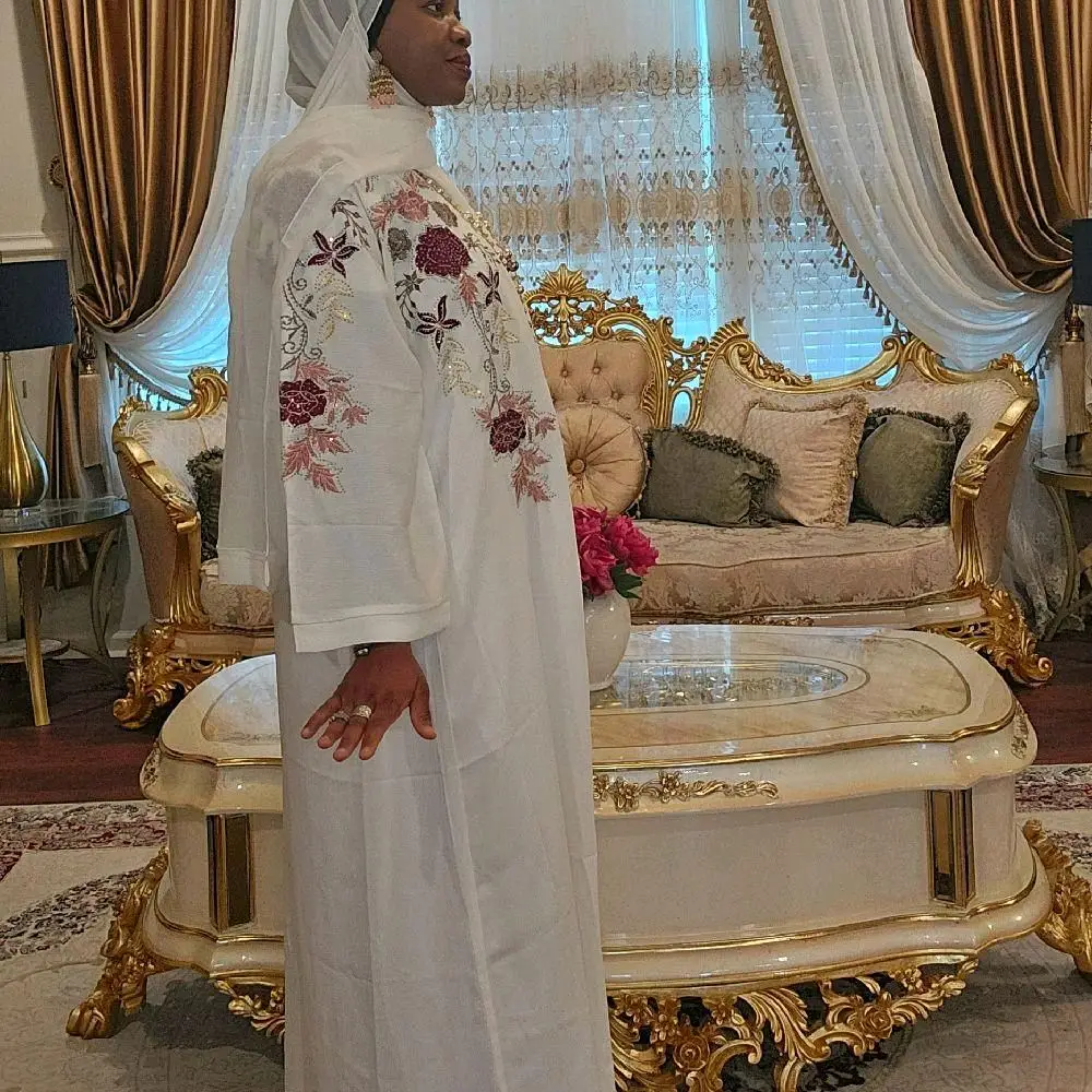 White Abaya with Blinged Embroidered Details Elegant Design for Stylish Wear