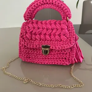 Pink hand bag.