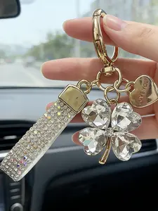 Four-Leaf Clover Lucky Keychain, Elegant Graphic Design, Perfect for Handbags and Car Keys, Ideal Gift for Women, Collectible Accessory, Heart Keychain