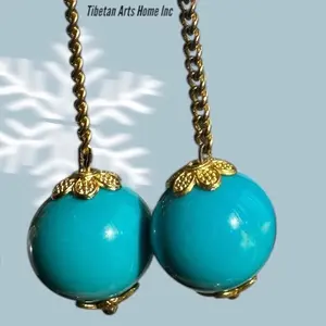 Authentic American Turquoise with gold plated earrings for women.