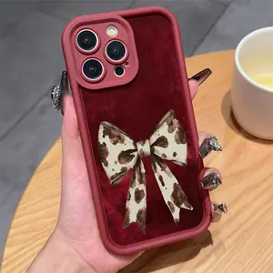 A Wine-Red Phone Case Featuring a Cow Print Bow Design on a Red Background, Compatible with TPU Patterns, Suitable for iPhone 17 E Air Pro ProMax iPhone16 15 14 Plus 13 12 Mini 11 X XS XR.Phone Case with Fashionable Design, Artistic Patterns