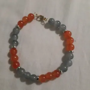 Orange blast glass bead wire bracelet
