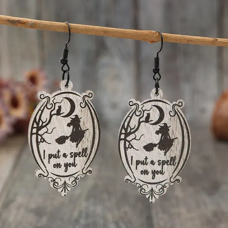 'I Put A Spell On You' Wooden Earrings, Witchy Mismatched Dangle Jewelry with Witch on Broomstick Graphic for Halloween, Statement Earrings