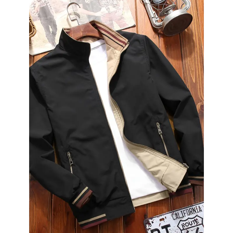 A Reversible Long-Sleeve Windbreaker Jacket with a Stand Collar And Zipper, Suitable for Both Casual Outdoor Wear, Offering Two Styles in One Garment.