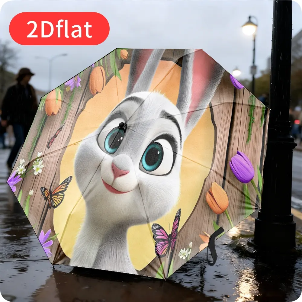 An Easter Bunny Folding Umbrella – featuring an adorable cartoon bunny design surrounded by blooming flowers and colorful butterflies; lightweight and portable, with a durable canopy made of sturdy plastic and metal,