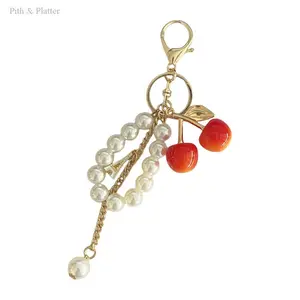 Pearl Cherry Keychain for Women – Trendy Acrylic Cherry Bag & Car Pendant, Premium Sense Fashion Accessory, Versatile Charm for Handbags, Backpacks, Car Keys, Gifts & Daily Wear
