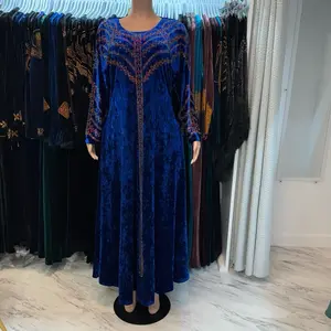 black and blue velvet dress with rhinestone design in chest and sleeve