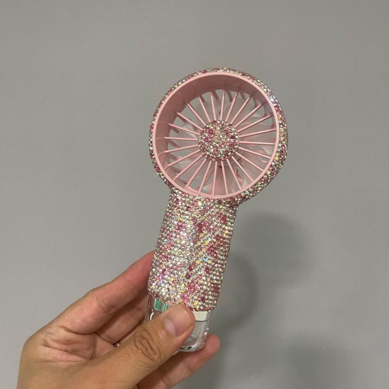 Rechargeable Mini Spray Fan—a portable, diamond-shaped handheld fan featuring long-lasting battery life. Ideal for weddings, outdoor activities, office desktops, and travel; it also makes a delightful gift for Valentine's Day and Mother's Day.