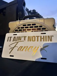 It Aint Nothing Fancy Front License Plate - 12x6 Inches, Weather Resistant, Handmade in the USA, Humor Decal for Trucks & Cars, Easy Installation