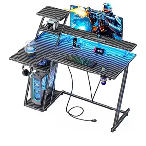 Furologee 55 Inch Gaming Desk with LED Lights and Power Outlet Small Gaming Computer Desk with Storage Shelves L Shaped Gamer Workstations with Monitor Stand for Bedroom in Carbon Fiber Black
