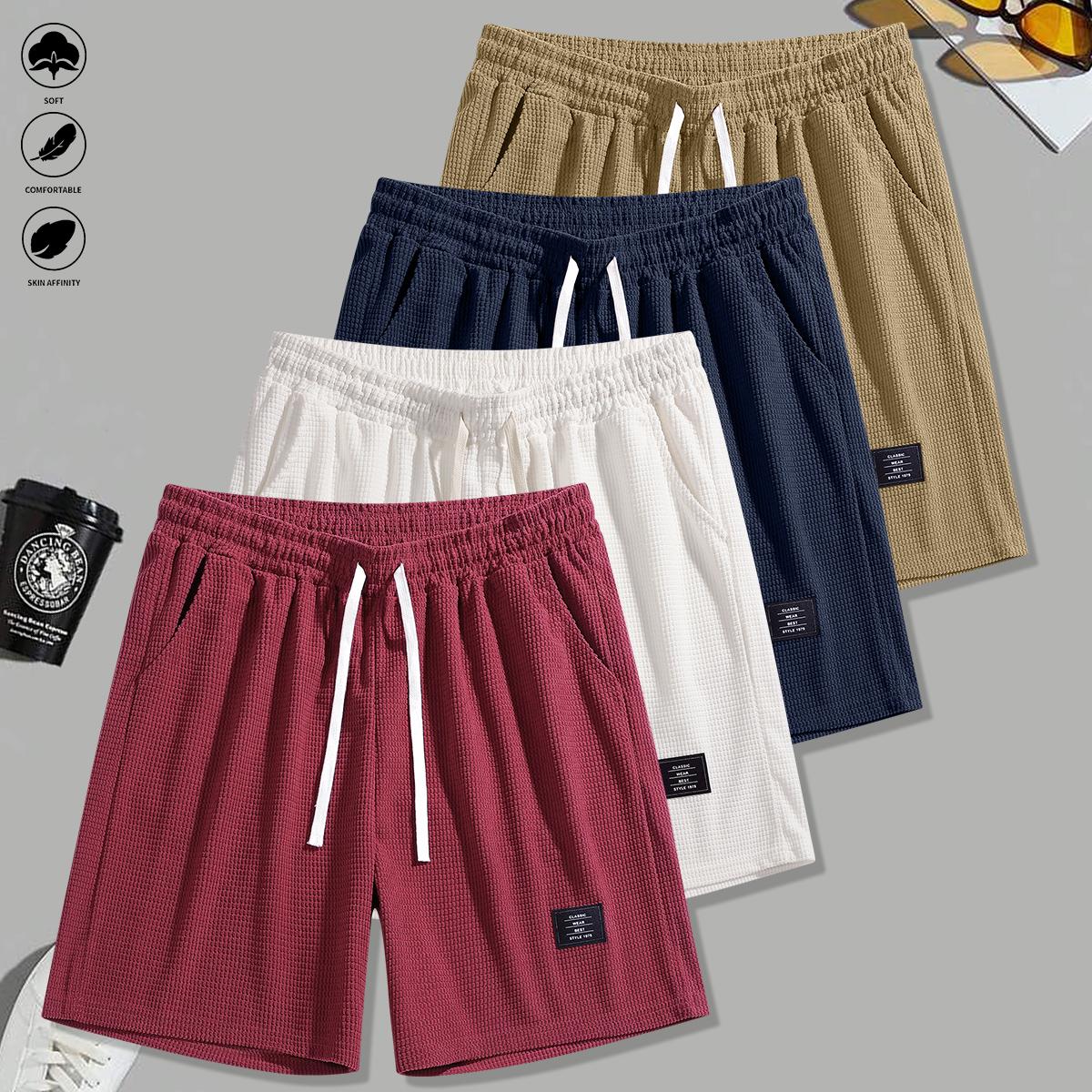 Set of 4 men’s summer new loose casual athletic shorts featuring an elastic waistband with drawstring adjustment, side pockets for convenient storage, knit fabric—ideal for running, workouts, outdoor activities, and everyday wear.