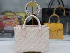 Pre-owned Louis Vuitton LEATHER Tote Bags SUMMER STAR DUST IN MONOGRAM EMPREINTE ONTHEGO HANDBAG
