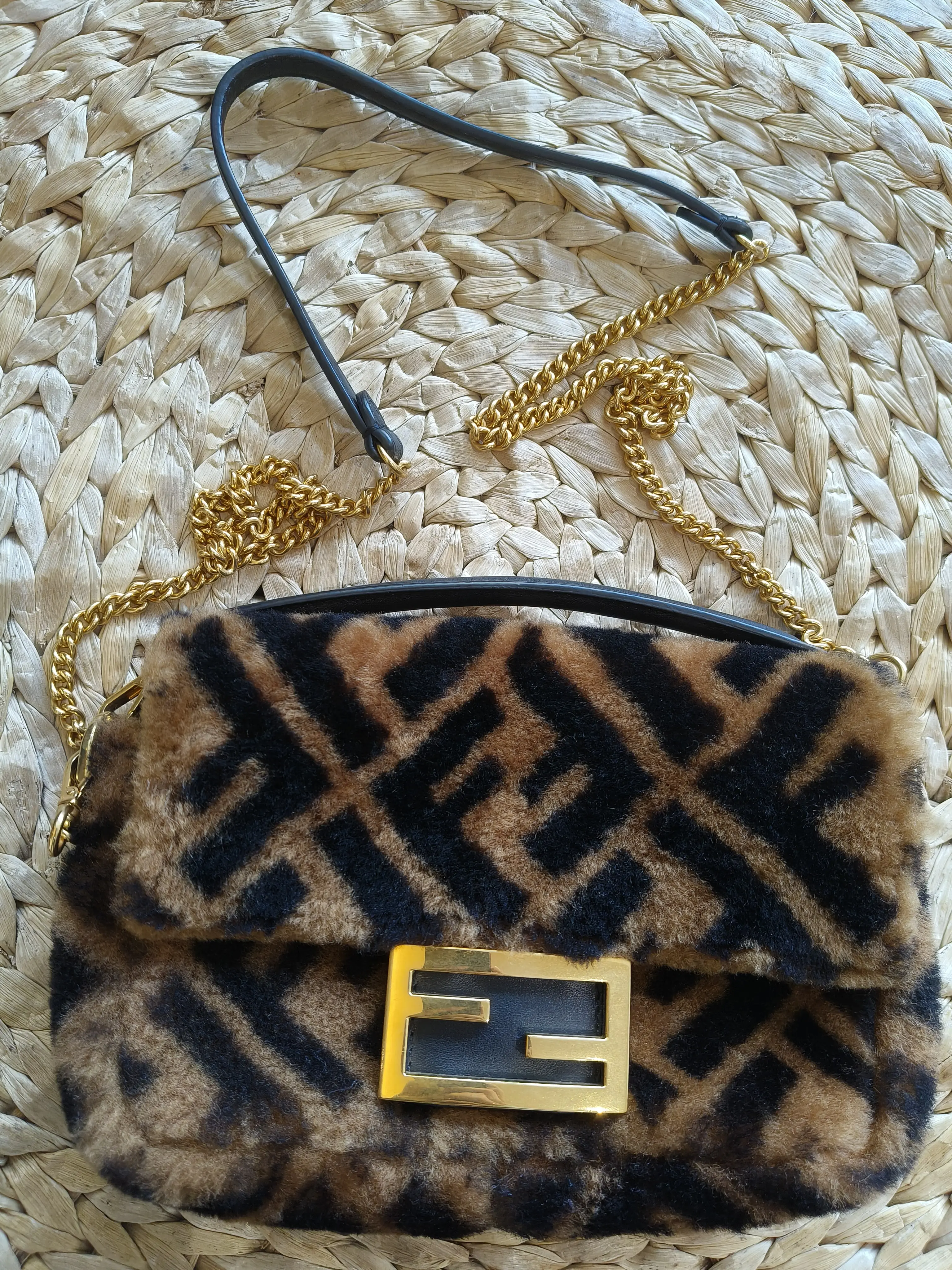 Pre-owned FENDI Mini Baguette Crossbody Bag in FF Monogram Fur, Iconic Baguette Design.