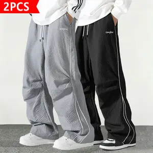 Men's 2-Pack Waffle-Textured Wide-Leg Drawstring Elastic Waist Pants - Black + Gray, Side Stripes, Loose-Baggy Fit, All-Season Activewear with Letters for Everyday Wear, Athletic Workouts