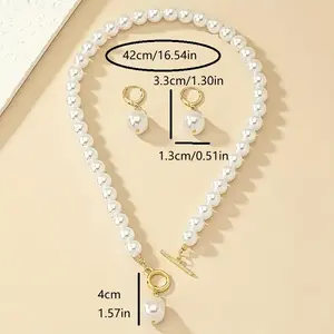 Elegant jewelry set consisting of earrings and necklace, designed with spherical gemstones, OT clasp, and artificial pearl.