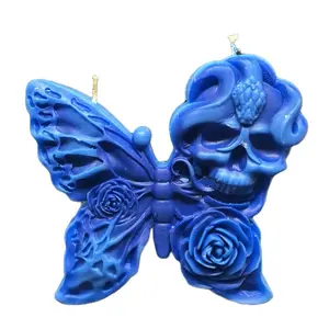 Spooky Butterfly Candle - Skull Design with Floral Accents Unique Decorative Item