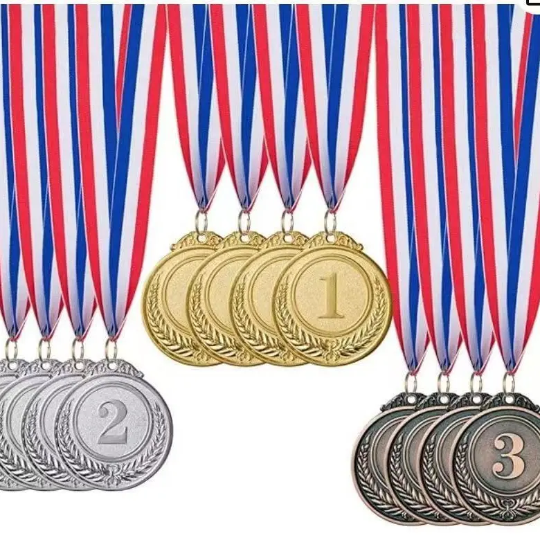 Small gold, silver, and bronze medals wi