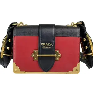 Pre-owned Carol Kelly Leather Crossbody Bags Prada Milano Red Cahier Crossbody Bag Embellished with Gold Accents and Black Trim Crossbody Bags