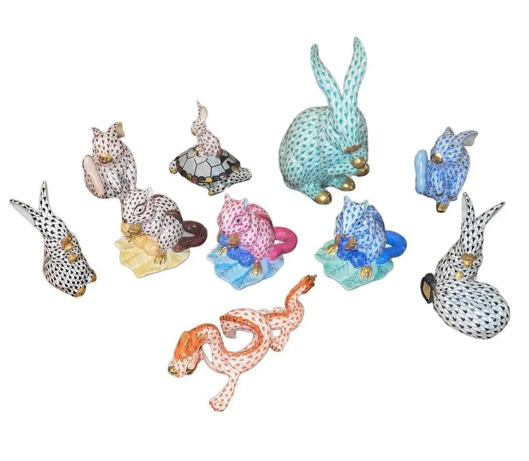 Set of Ten Herend Fishnet Porcelain Animal Figurines. Hungary, 20th Century.