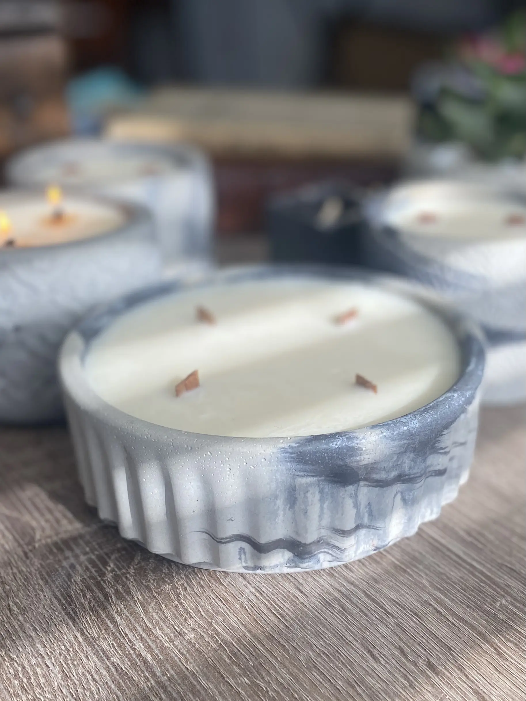 Large four wick Centerpiece candle in hand crafted cement vessel, with clean burning wax