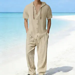 Men’s solid-color linen set for a casual, fashionable coordinated look—breathable, quick-drying top paired with drawstring wide-leg pants, ideal for beach vacations; summer menswear collection.