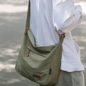 Men's shoulder bag, lightweight cloth bag, women's large-capacity backpack, men's versatile Japanese messenger bag, college student class schoolbag