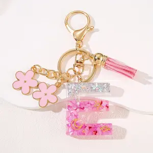 1pc Women's Fashion Keychain - Cute Pink Floral Resin Key Ring with Golden-Tone Letter Charm (A E K L M S), Tassel & Lobster Clasp for Car Keys, Backpack, Purse - Gift for Women, Mothers, Cute Keychains for s, Stylish Key Organizer, Playful Design