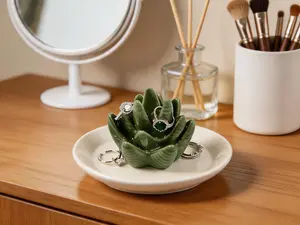 Ceramic aloe and cactus shaped ring holder, serving as a delicate jewelry dish. A thoughtful gift option for women for Christmas, birthdays and daily use.
