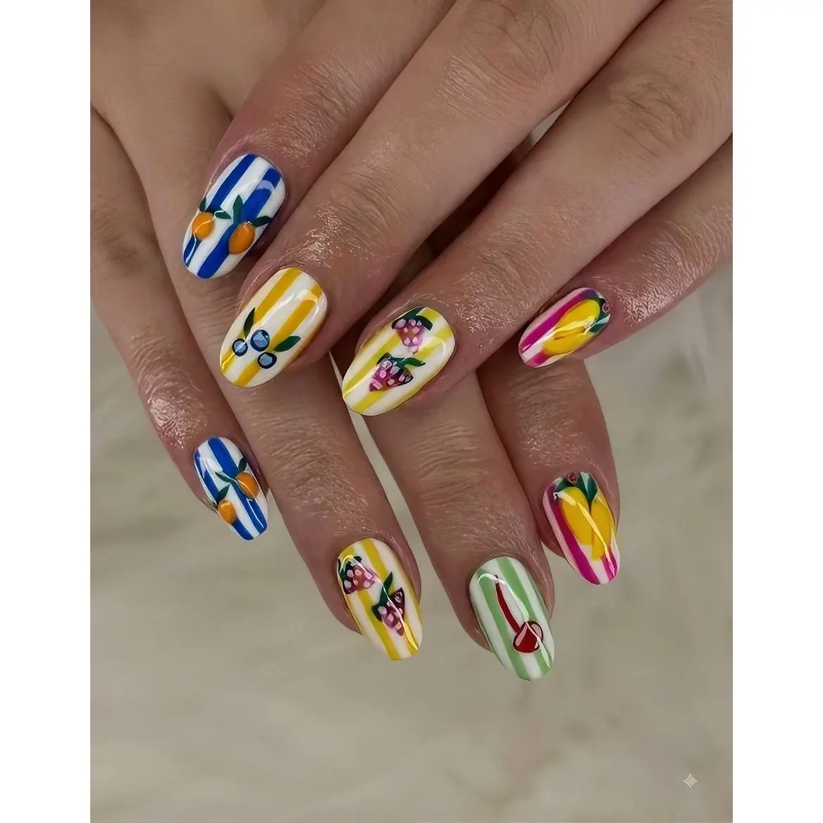 Vibrant Fruit and Stripe Nail Art Design for Stylish Manicure