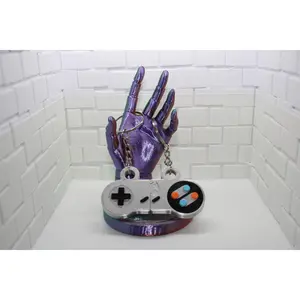 Retro Gamer's Dream: SNES Controller Matching Keychain Set