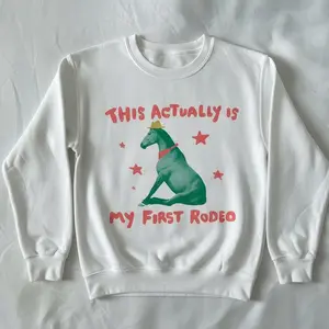 Funny “This Actually Is My First Rodeo” Horse Crewneck Sweatshirt – Unhinged Western Meme Graphic Sweatshirt