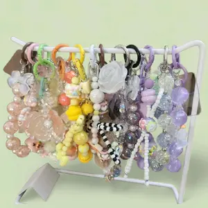 Live Phone Chain - Colorful Beaded Accessories Displayed on Rack
